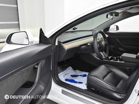 Tesla Model 3 — photo 11