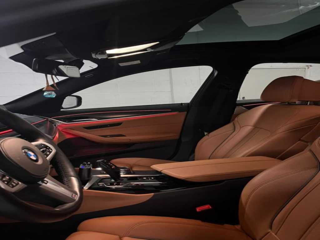 BMW 5-Series — photo 10