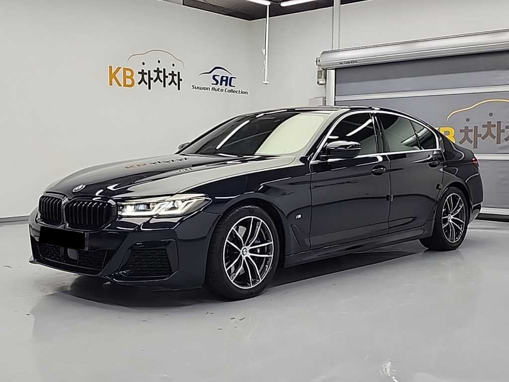 BMW 5-Series — photo 01