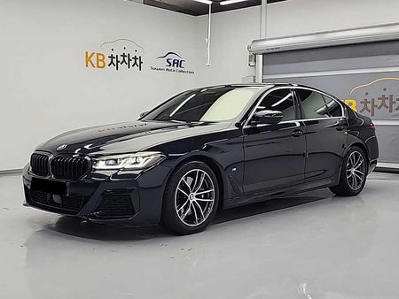BMW 5-Series — photo 01
