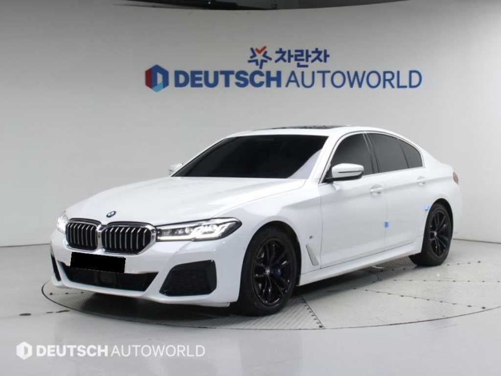BMW 5-Series — photo 01