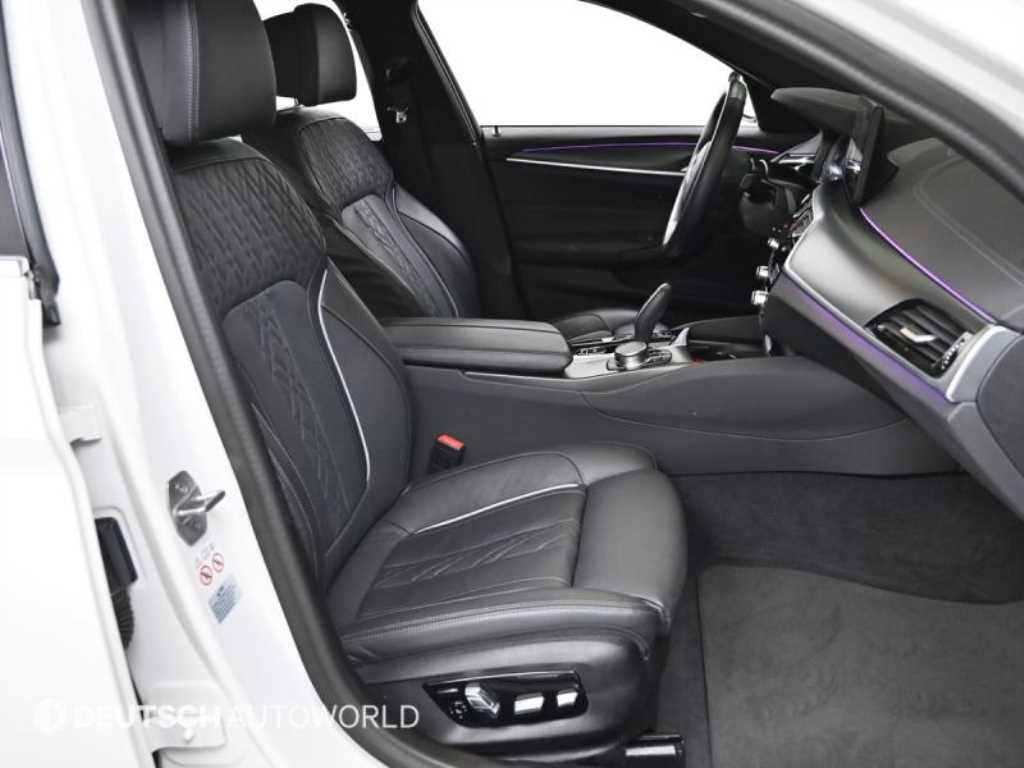 BMW 5-Series — photo 10
