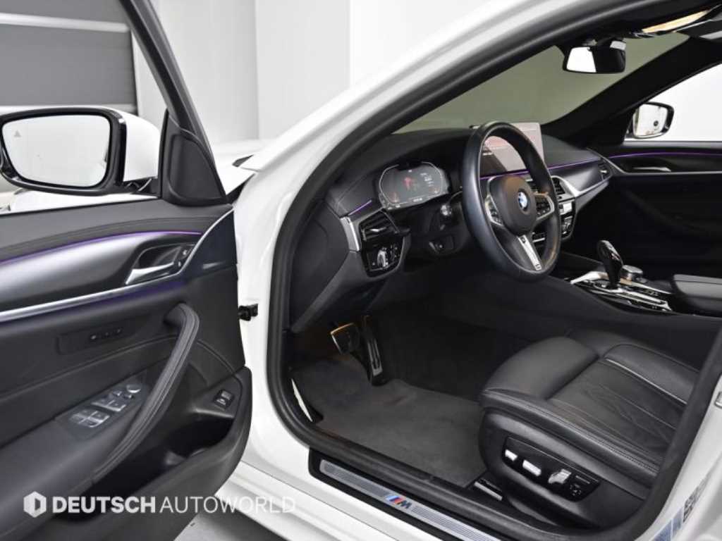 BMW 5-Series — photo 11