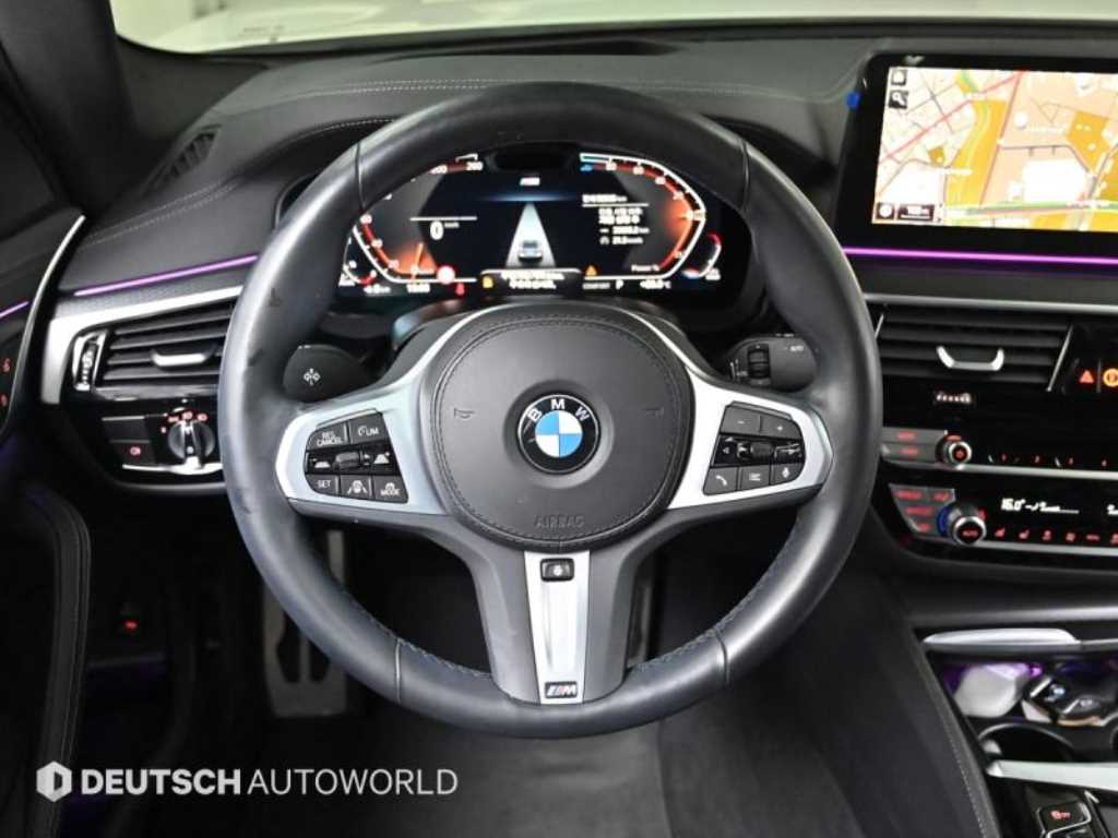 BMW 5-Series — photo 13