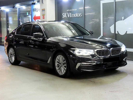 BMW 5-Series — photo 01