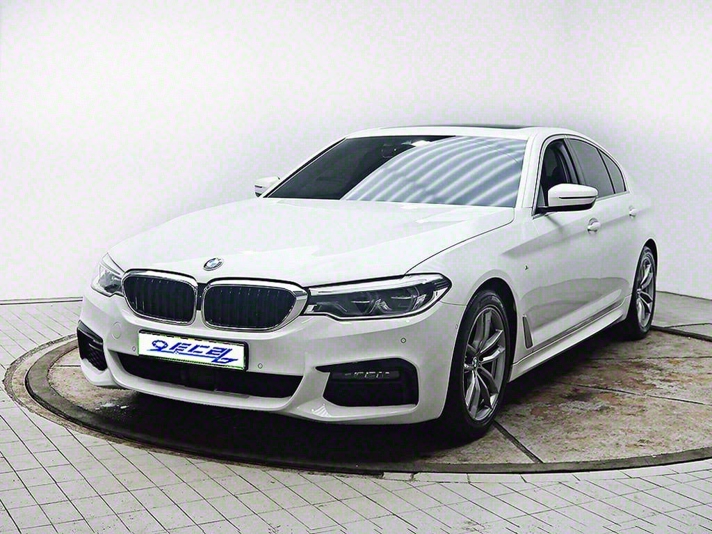 BMW 5-Series — photo 02