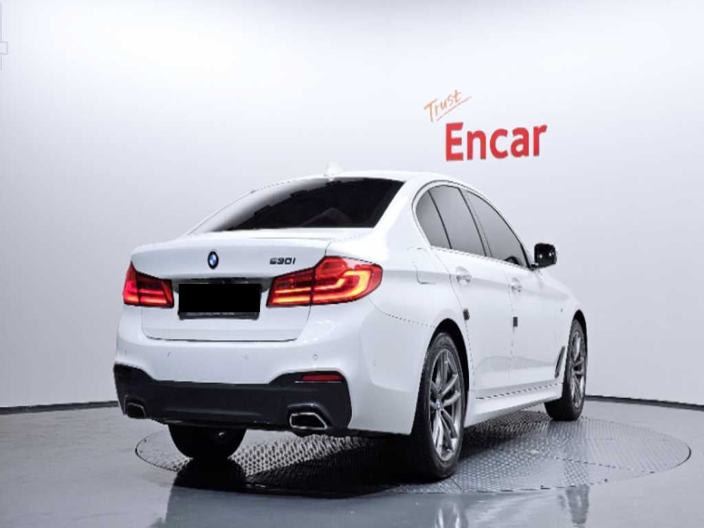BMW 5-Series — photo 02