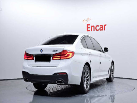 BMW 5-Series — photo 02