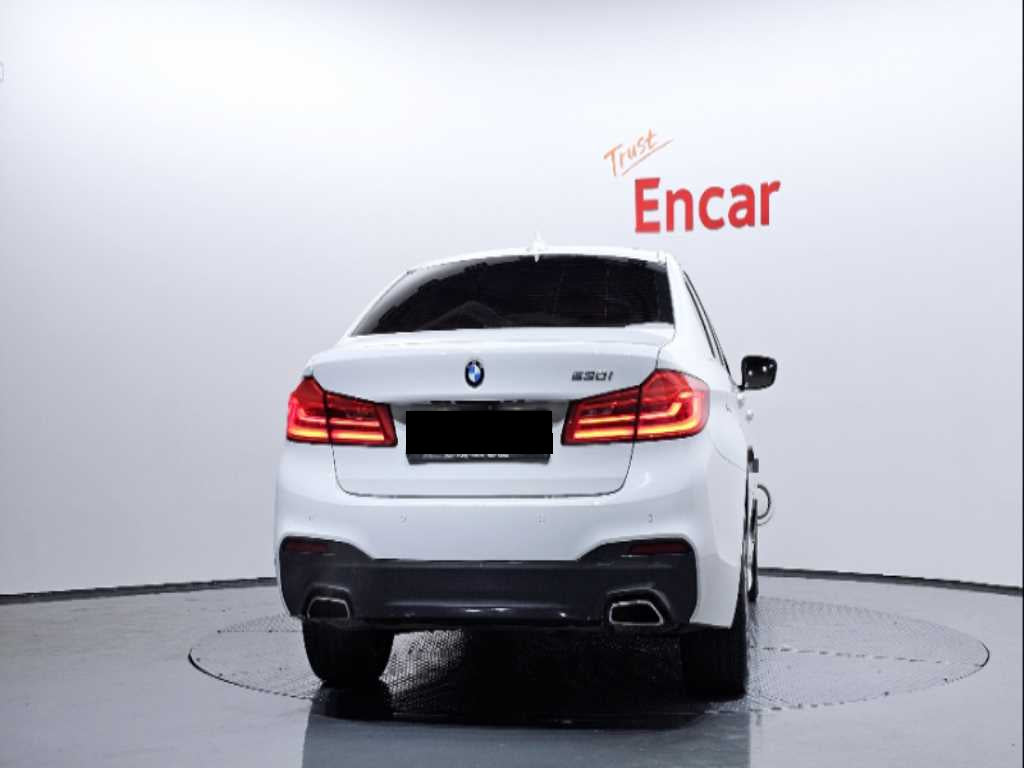 BMW 5-Series — photo 04