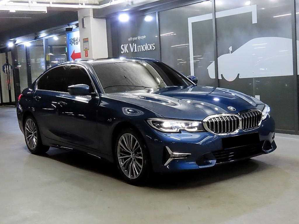 BMW 3-Series — photo 01