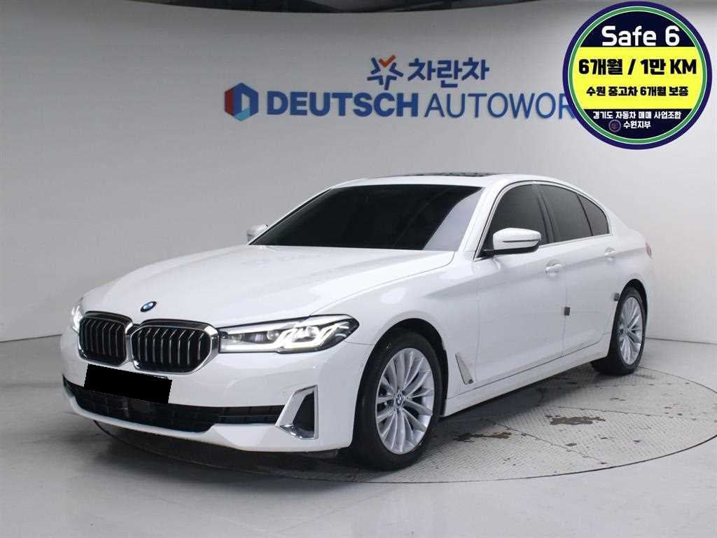 BMW 5-Series — photo 01