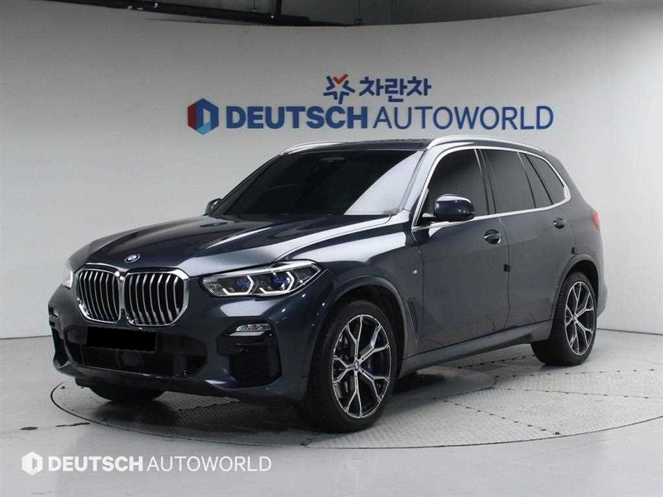BMW X5 — photo 01