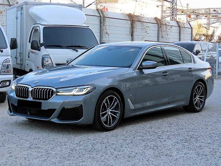 BMW 5-Series — photo 01