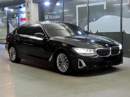 BMW 5-Series — photo 01