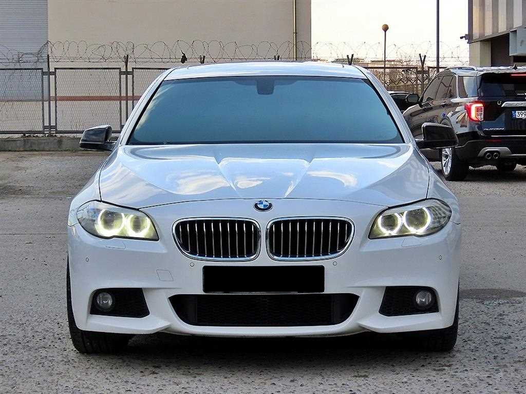 BMW 5-Series — photo 01