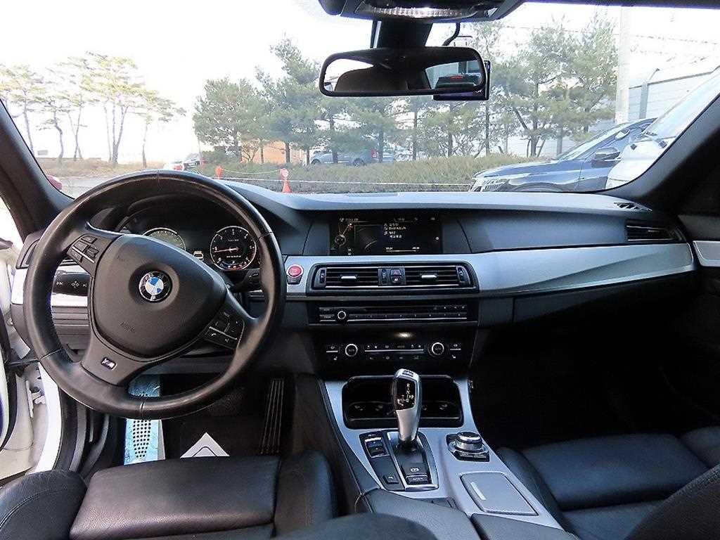 BMW 5-Series — photo 07