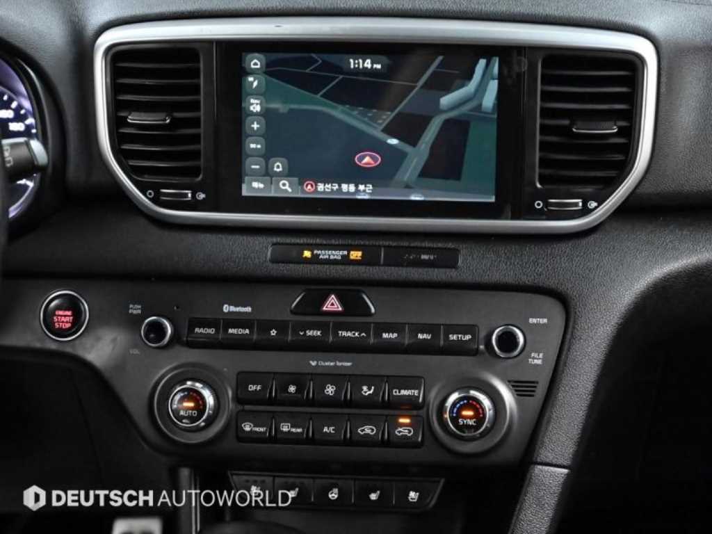 Kia Sportage — photo 14