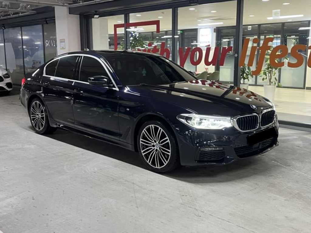 BMW 5-Series — photo 01