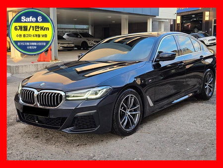 BMW 5-Series — photo 01