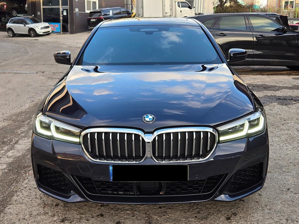 BMW 5-Series — photo 02