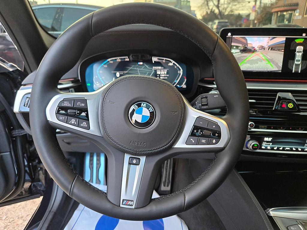 BMW 5-Series — photo 07