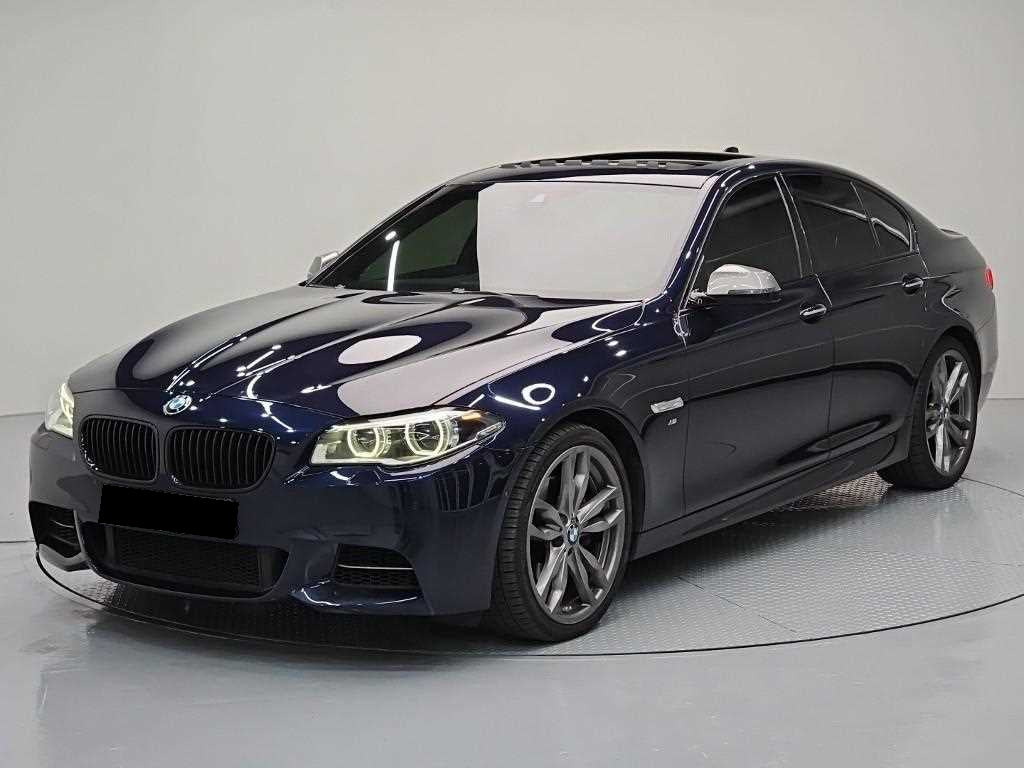 BMW 5-Series — photo 01