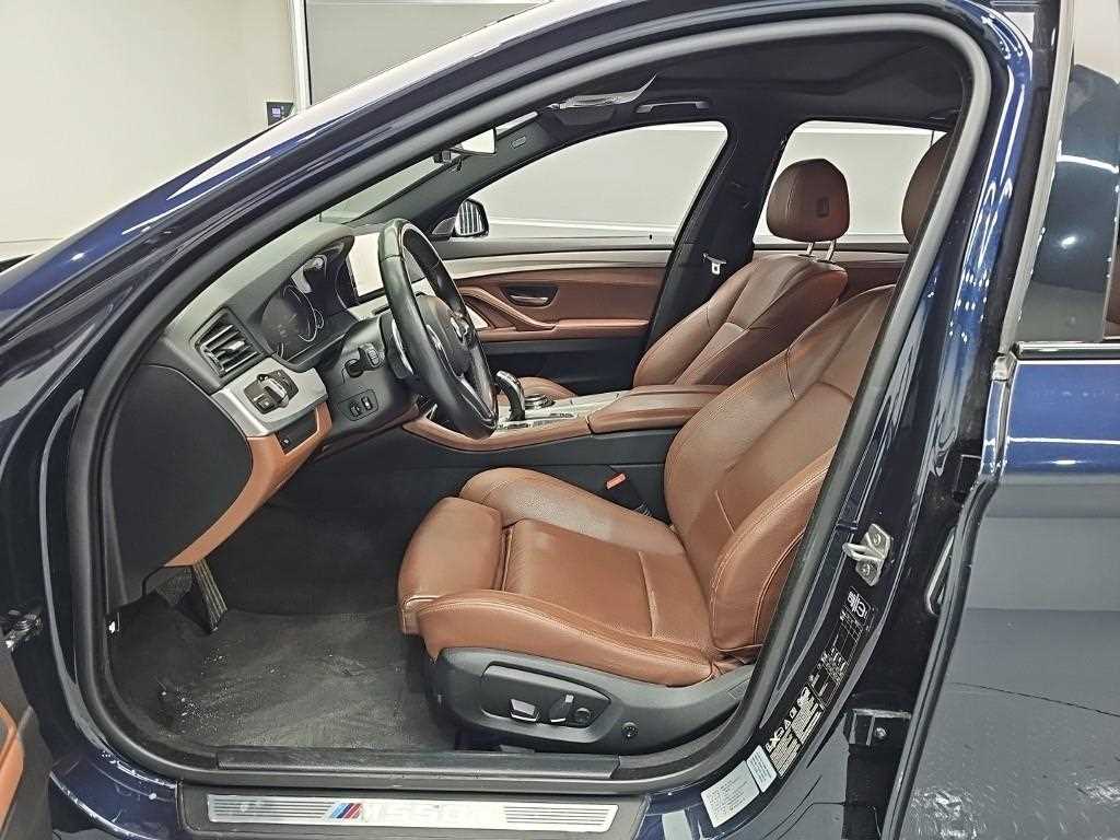 BMW 5-Series — photo 11
