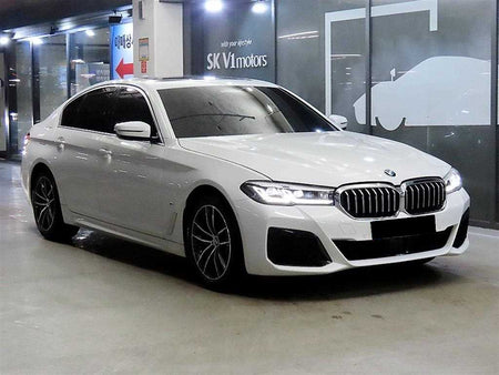 BMW 5-Series — photo 01