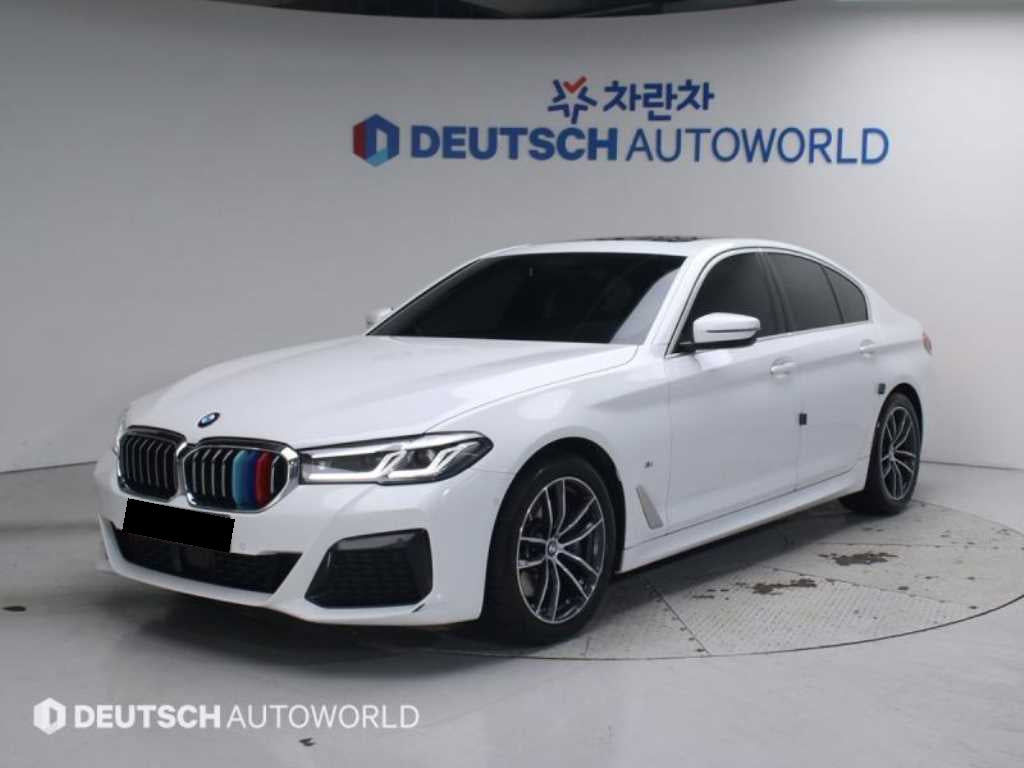 BMW 5-Series — photo 01