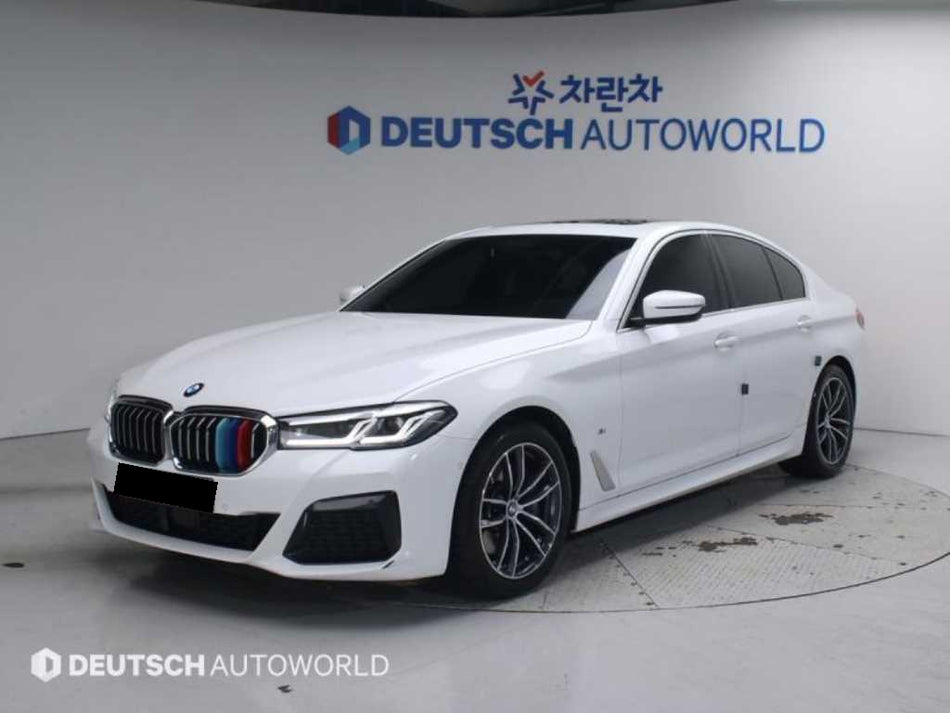 BMW 5-Series — photo 01