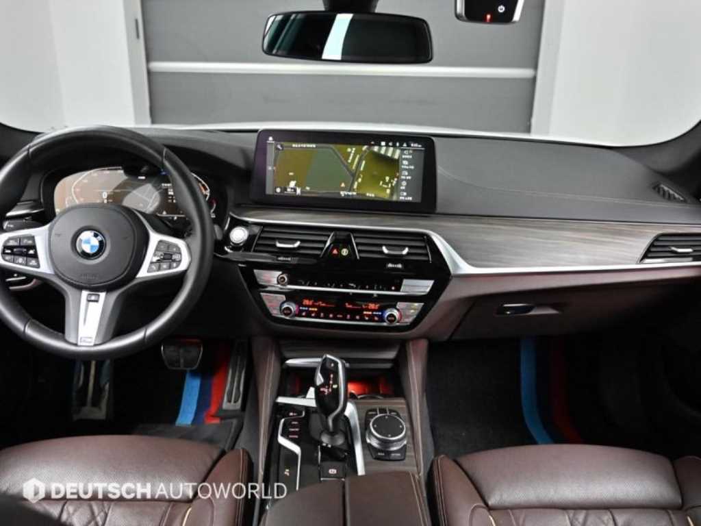 BMW 5-Series — photo 07