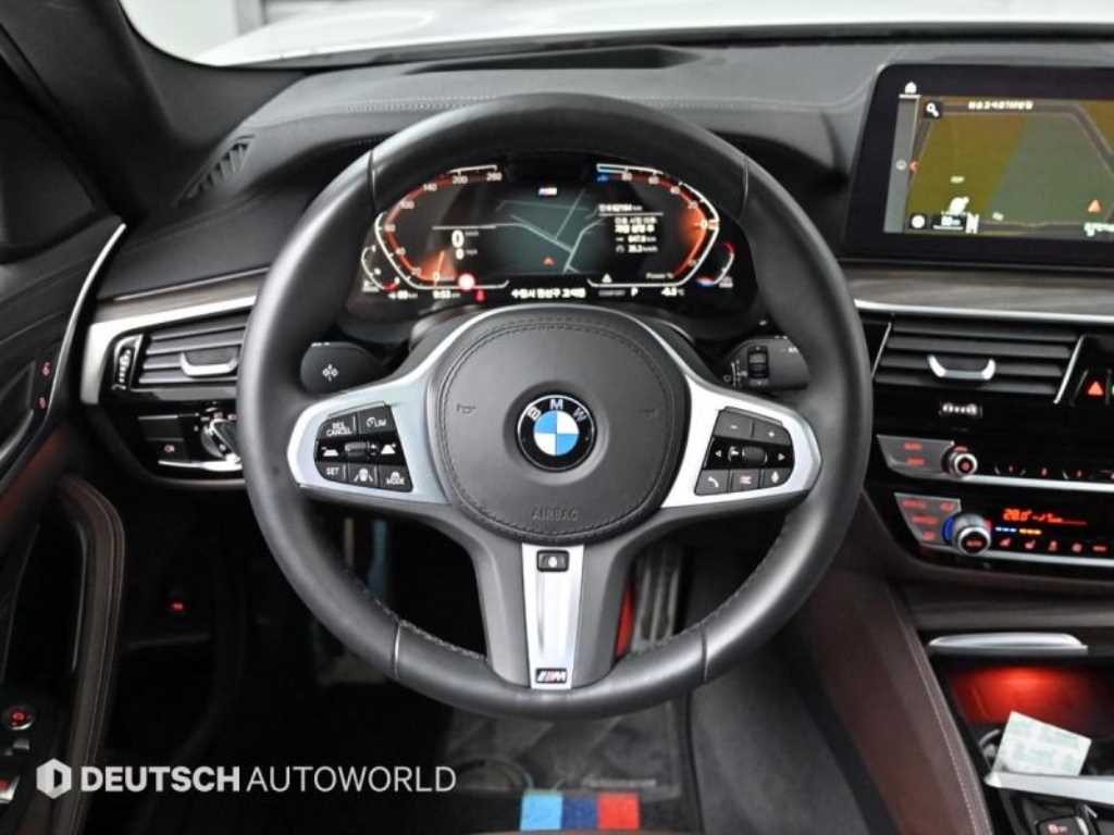 BMW 5-Series — photo 13