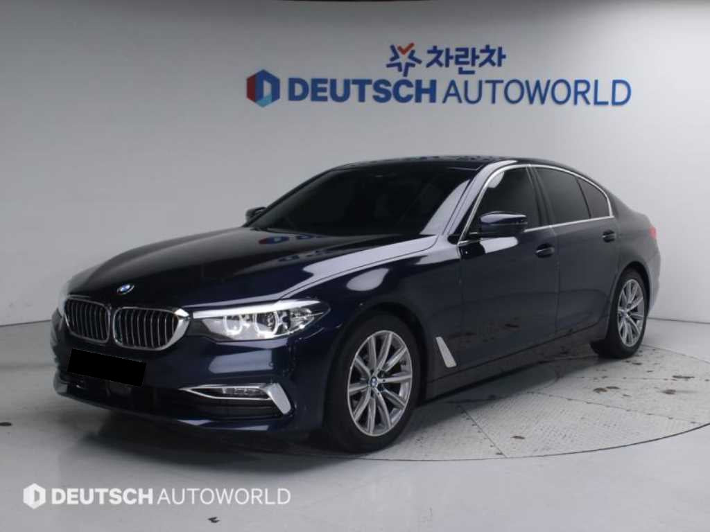 BMW 5-Series — photo 01