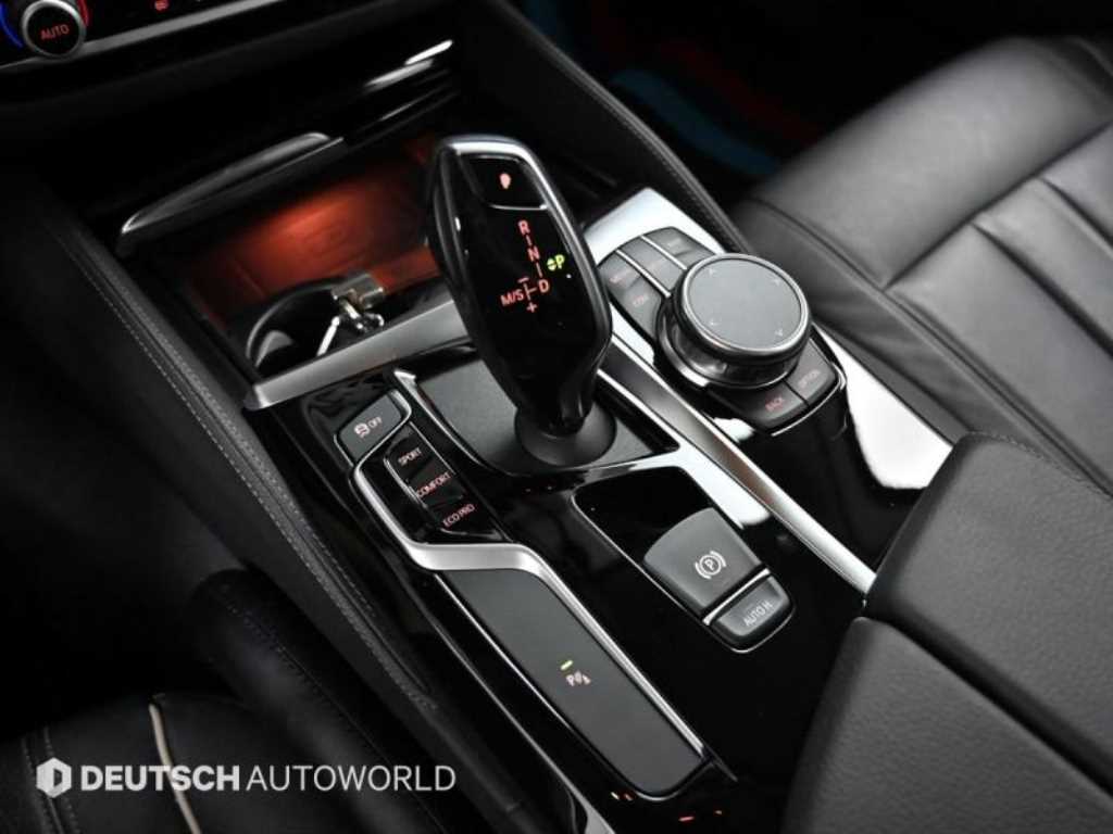 BMW 5-Series — photo 09