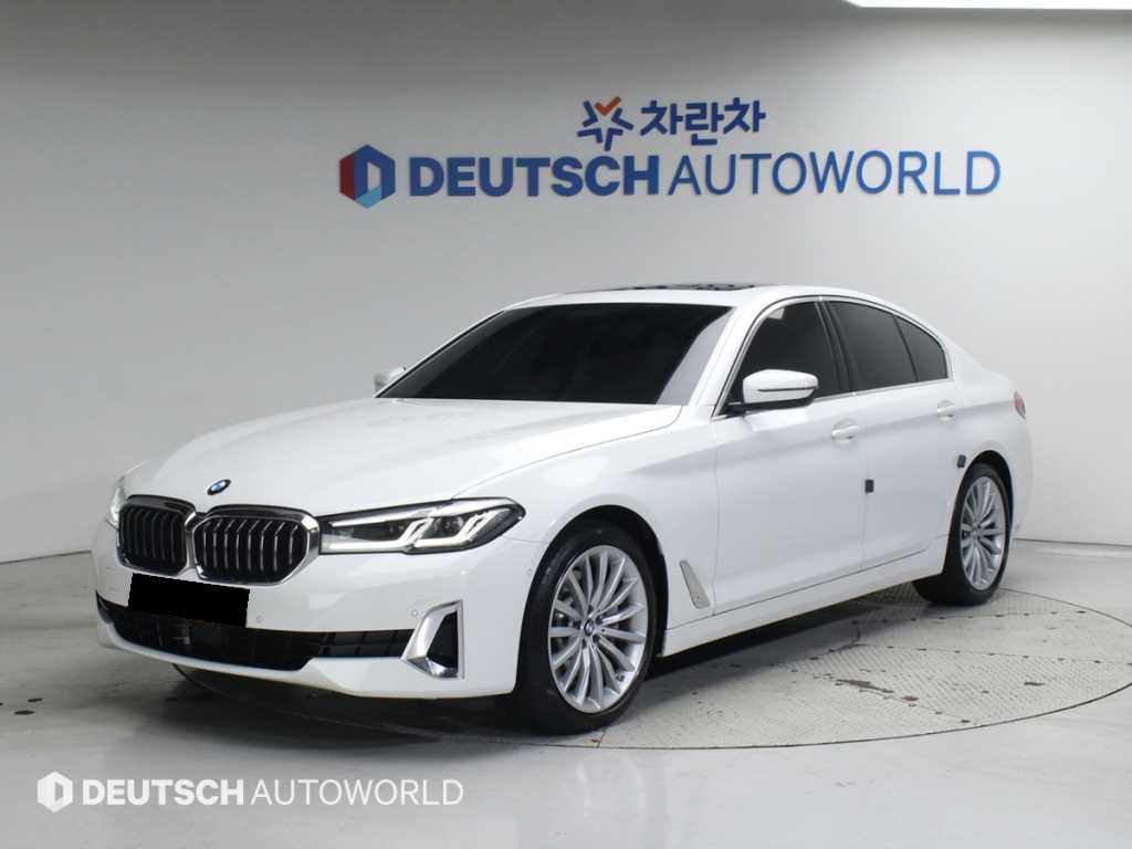 BMW 5-Series — photo 01