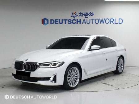 BMW 5-Series — photo 01