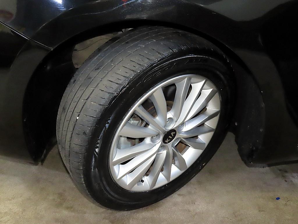 Kia K7 — photo 20