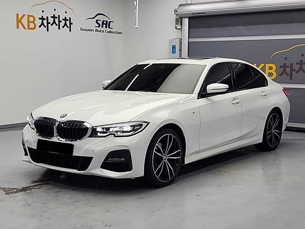 BMW 3-Series — photo 01
