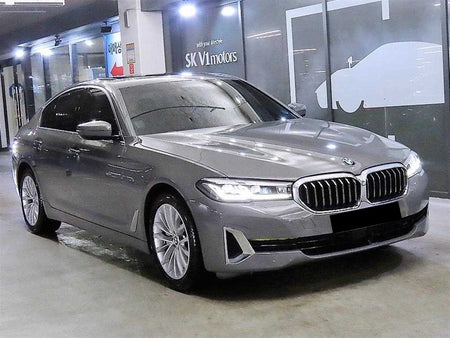 BMW 5-Series — photo 01