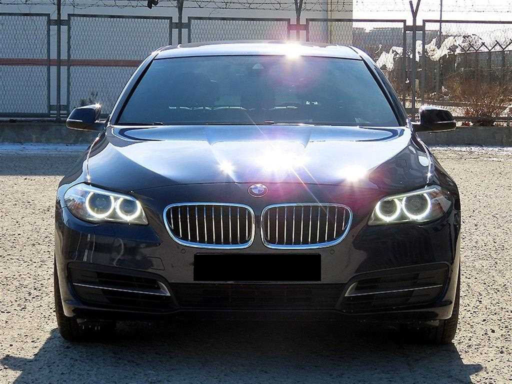 BMW 5-Series — photo 01