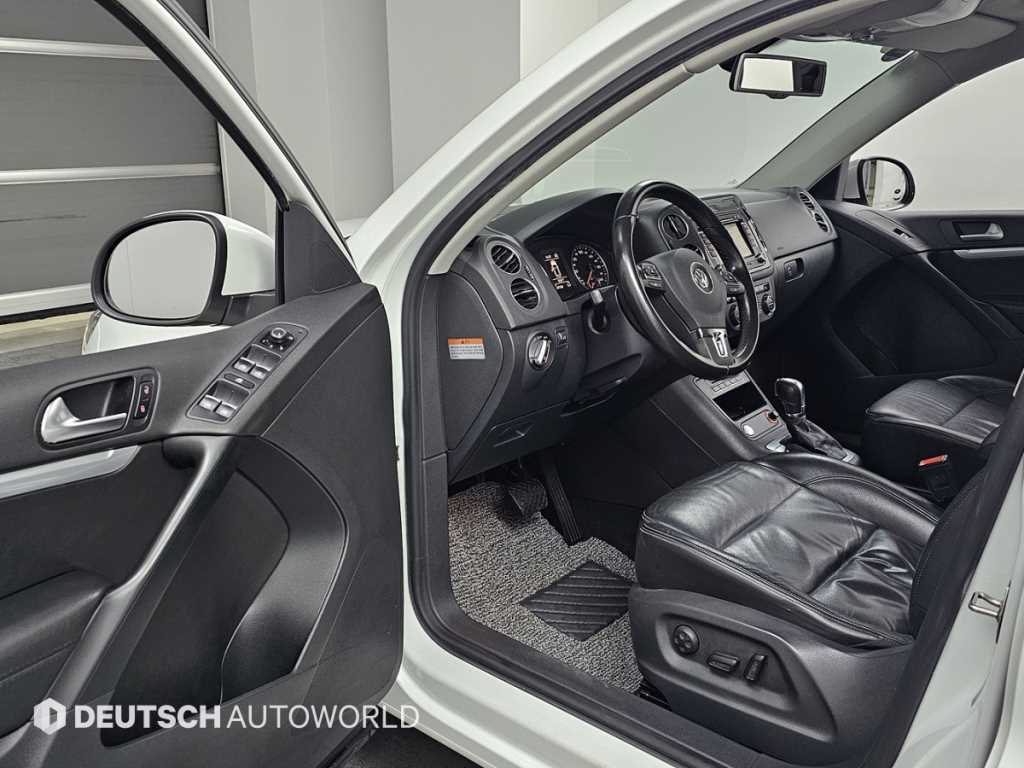 Volkswagen Tiguan — photo 11