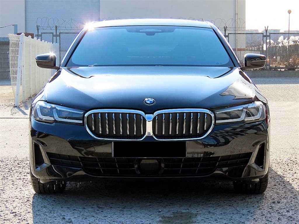 BMW 5-Series — photo 01