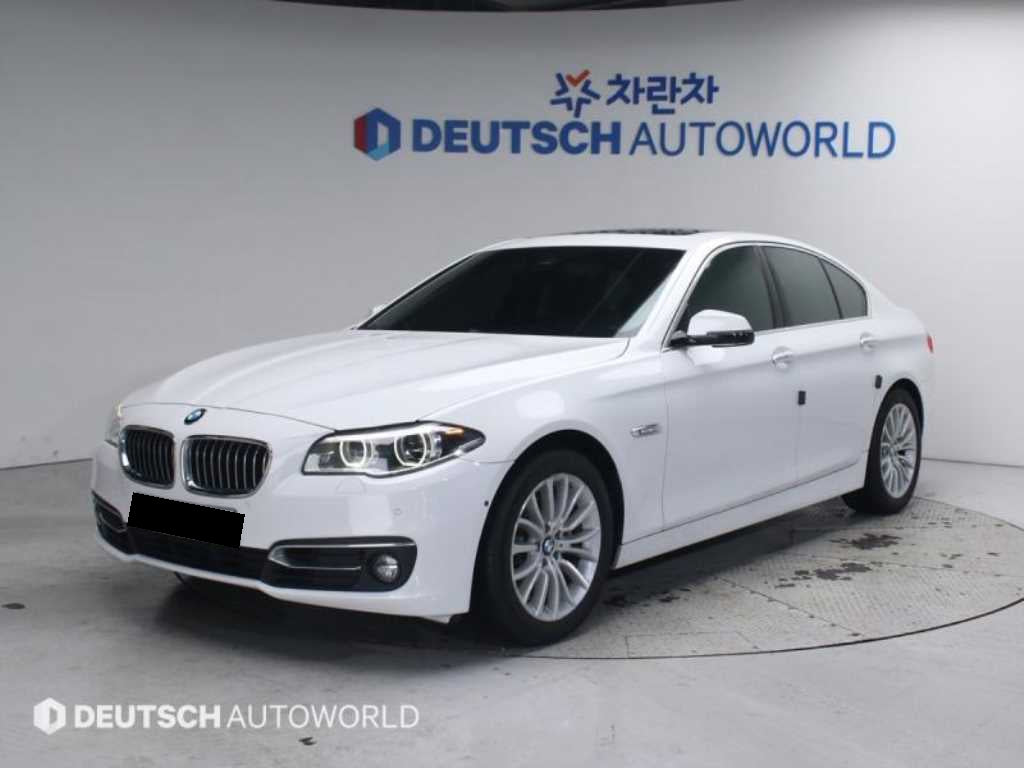 BMW 5-Series — photo 01