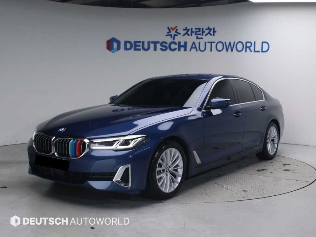 BMW 5-Series — photo 01