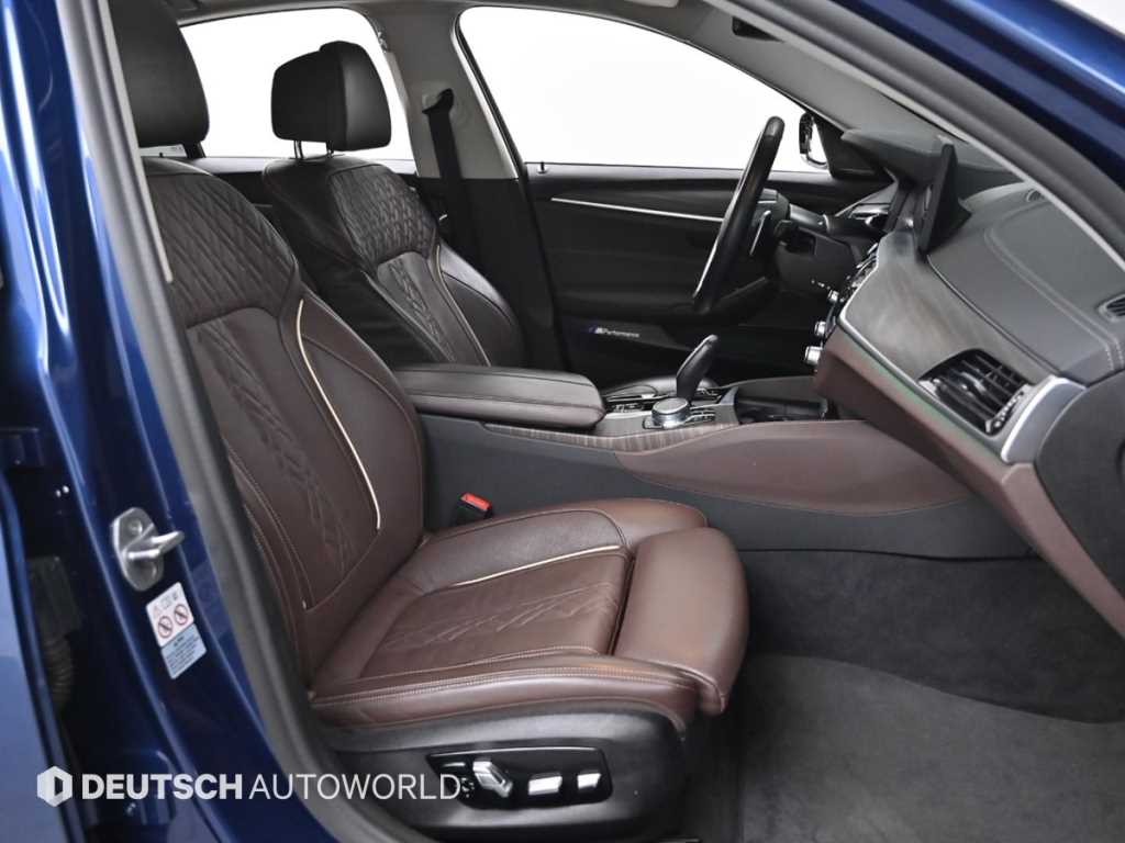 BMW 5-Series — photo 10