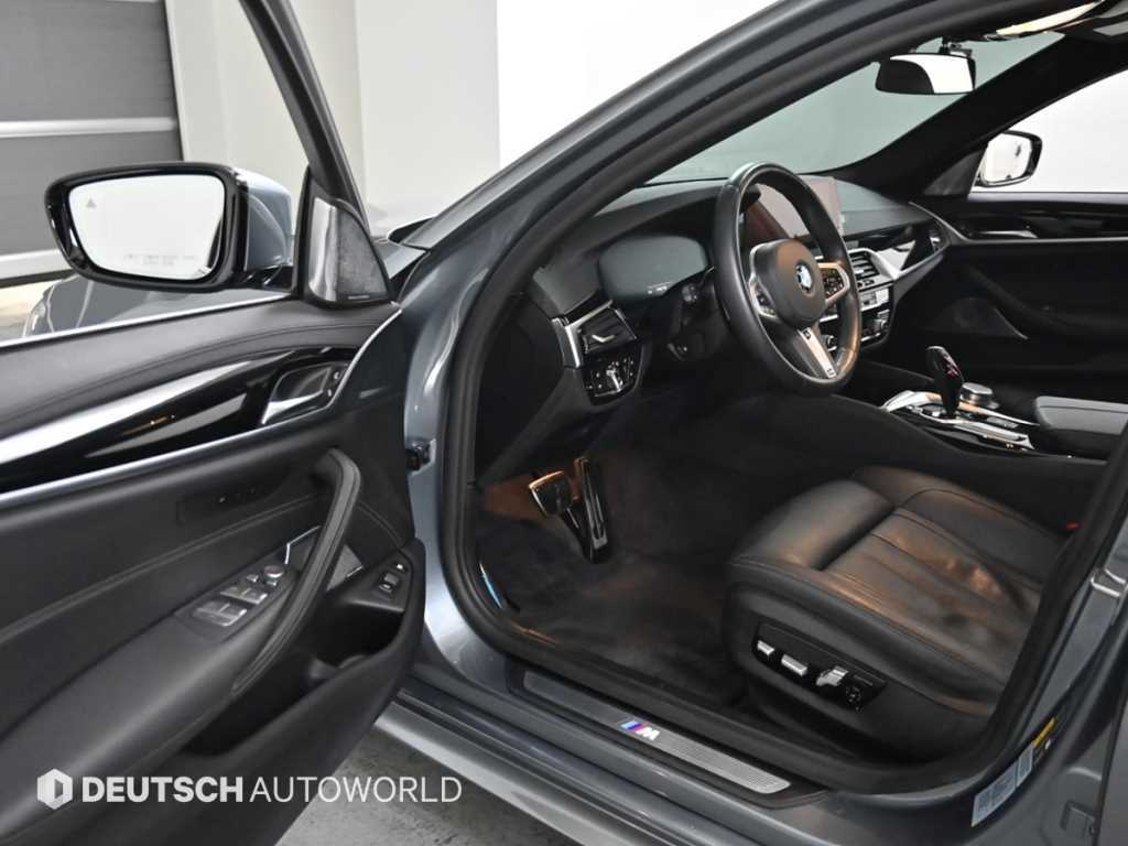 BMW 5-Series — photo 11