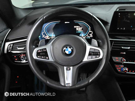 BMW 5-Series — photo 13