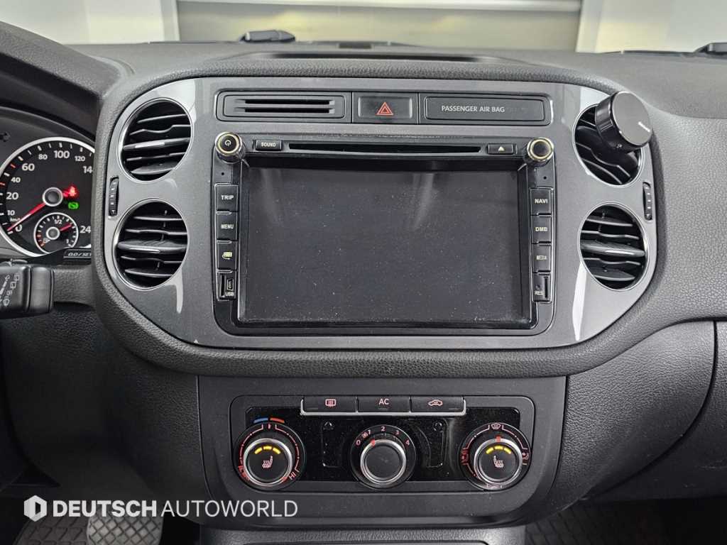 Volkswagen Tiguan — photo 14