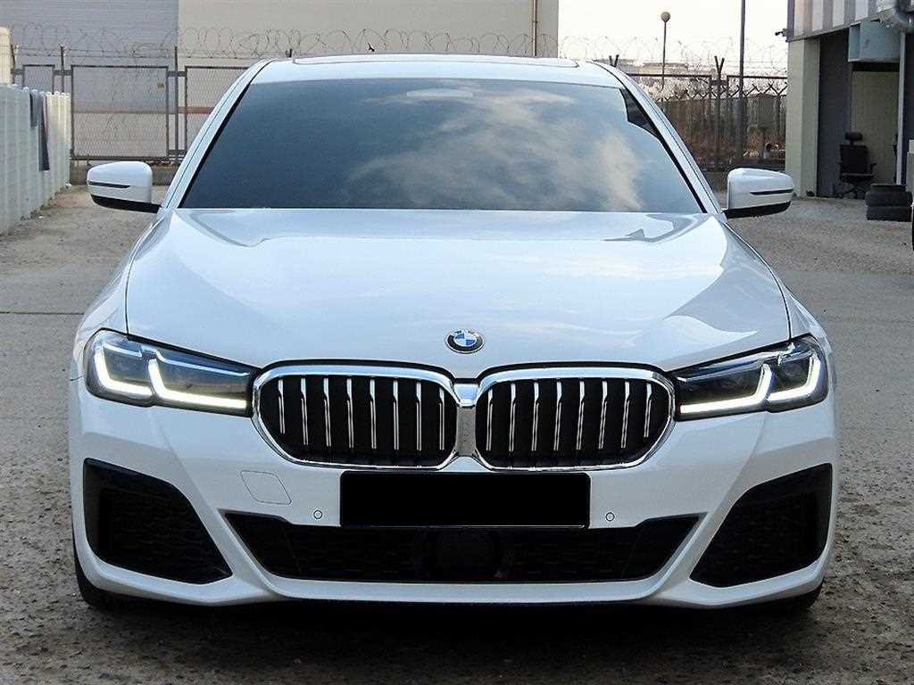 BMW 5-Series — photo 01