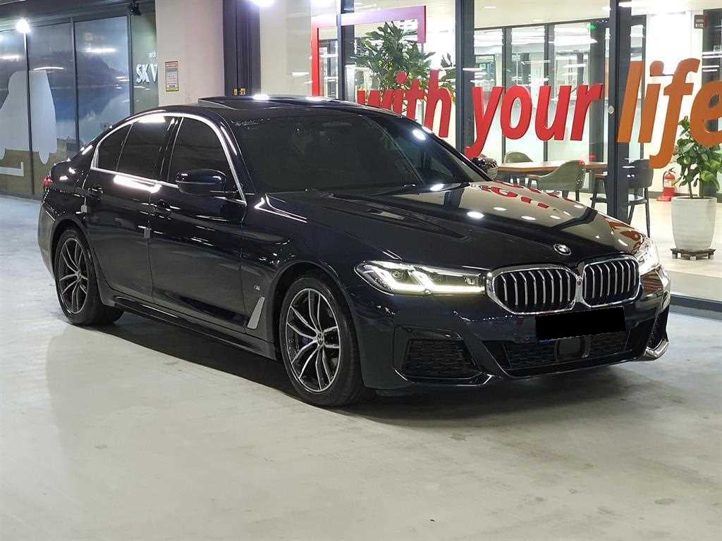 BMW 5-Series — photo 01